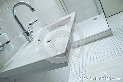 Sanitary with with chromium faucet and white bathroom Stock Photo