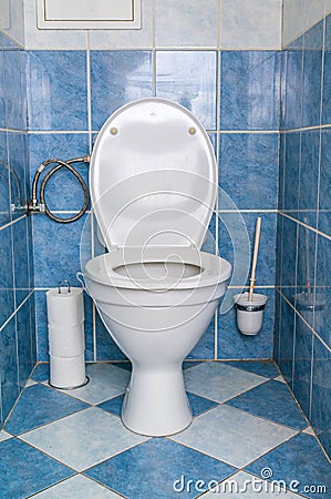 Sanitary concept. Toilet bowl in restroom Stock Photo