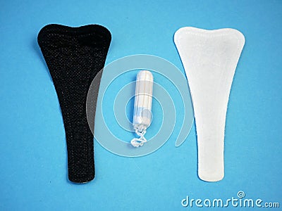 Sanitary white and black napkins for woman, menstrual pads. Menstruation cycle. Hygiene and protection Stock Photo