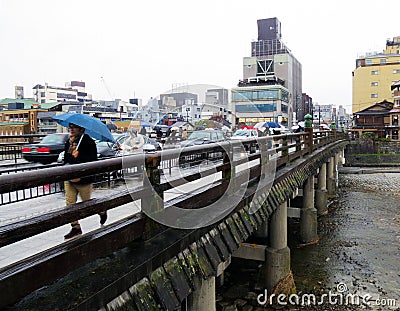 Sanjo Bridge in the rain, Kyoto, Japan Editorial Stock Photo