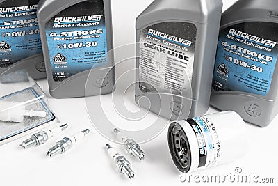 Sankt-Petersburg, Russia, April 28, 2021: Maintenance kit for Mercury, Suzuki or Honda outboard engine. Set of Quicksilver spare Editorial Stock Photo