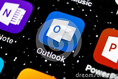 Microsoft Outlook office application icon on Apple iPhone X screen close-up. Microsoft outlook app icon. Microsoft OutLook applica Editorial Stock Photo