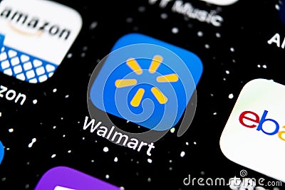 Walmart application icon on Apple iPhone X screen close-up. Walmart app icon. Walmart.com is multinational retailing corporation Editorial Stock Photo