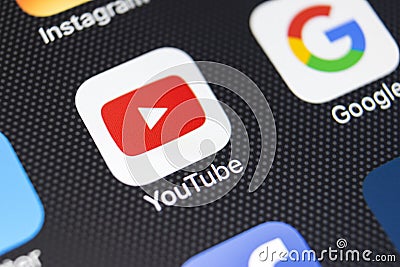 YouTube application icon on Apple iPhone 8 smartphone screen close-up. Youtube app icon. YouTube is an online video networking Editorial Stock Photo