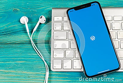 Wordpress application icon on Apple iPhone X screen close-up. Wordpress app icon. Wordpress.com application. Social network Editorial Stock Photo