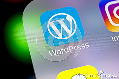 Wordpress application icon on Apple iPhone X screen close-up. Wordpress app icon. Wordpress.com application. Social network Editorial Stock Photo