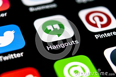 Google Hangouts application icon on Apple iPhone X smartphone screen close-up. Google hangouts app icon. Social network. Social me Editorial Stock Photo
