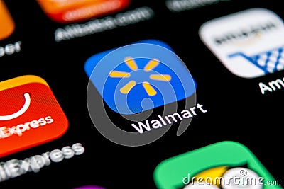 Walmart application icon on Apple iPhone X screen close-up. Walmart app icon. Walmart.com is multinational retailing corporation Editorial Stock Photo
