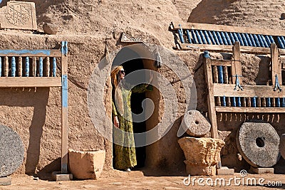 Sanli Urfa, Turkey- September 12 2020: Tourists posing in local clothes in front of harran houses Editorial Stock Photo