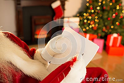 Santa checking his list Stock Photo