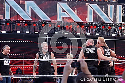 WWE NWO wrestlers Scott Hall, and Kevin Nash face off with DX and New Age Outlaws after match in ring Editorial Stock Photo