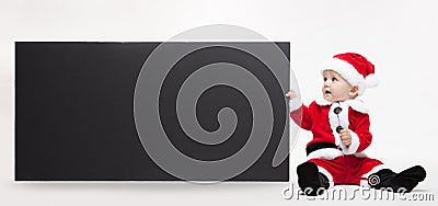 Santa Claus baby hold black advertisment banner blank Stock Photo