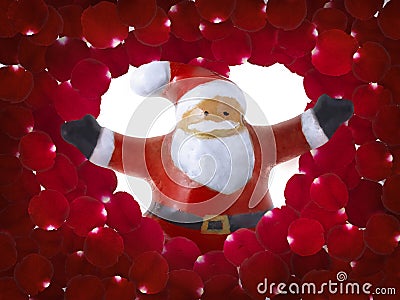 Santa Claus ceramic figurine emerges from red rose petals background Editorial Stock Photo