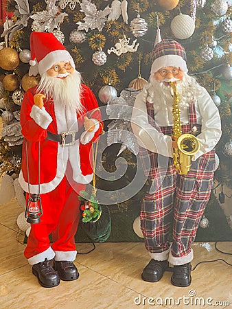 Santa Claus is a character in various cultures who tells of someone who gives gifts to children, especially on Christmas Day Stock Photo