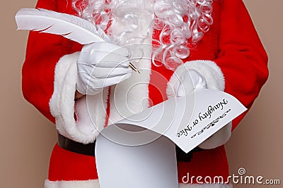 Santa Claus checking his list Stock Photo