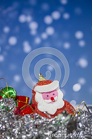 Santa Claus doll with abstract background Stock Photo