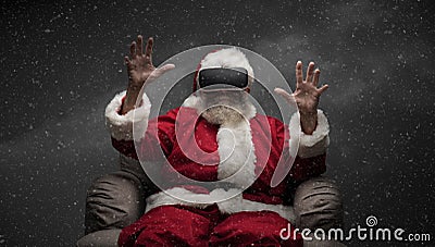 Santa Claus experiencing virtual reality Stock Photo