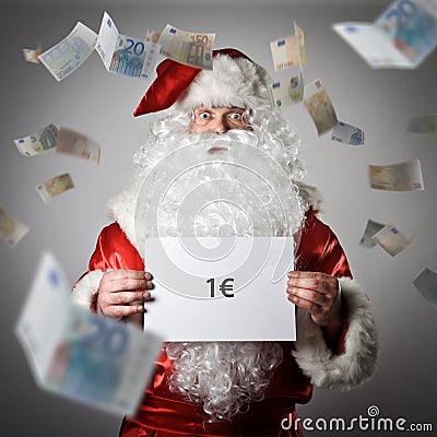 Santa Claus and falling Euro banknotes. Stock Photo