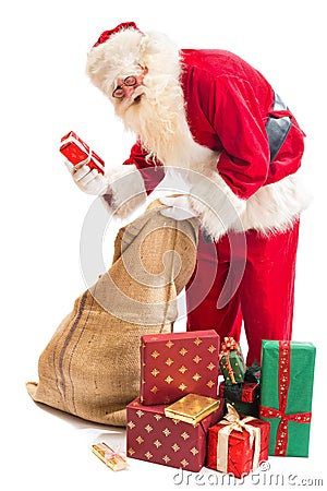 Santa Claus found his gift Stock Photo