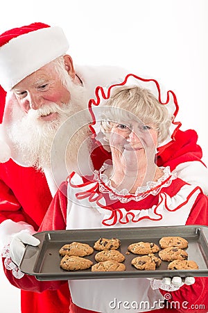 Santa claus and Mrs Santa with cookies Stock Photo