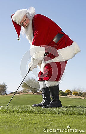 Santa Claus Playing Golf Stock Photo