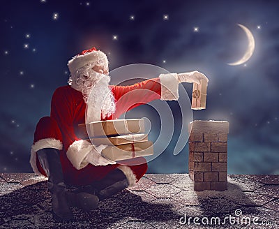 Santa Claus sitting on the roof Stock Photo