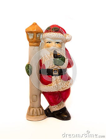 Santa Claus Statue at North Pole Sharp, White Background Stock Photo