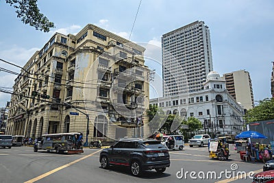 Santa Cruz, Manila, Philippines - Roman Santos Bldg and Regina Bldg, historical buildings along Escolta Street Editorial Stock Photo