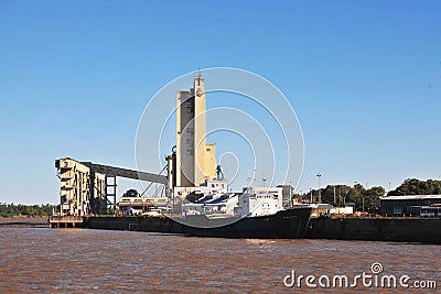 Santa Fe province. Argentina, very nice port of container ships and cereals, on the Parana river by day Stock Photo