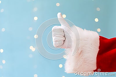 Santa giving thumb up Stock Photo