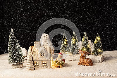 Santa has arrived at the little forest cottage. Stock Photo