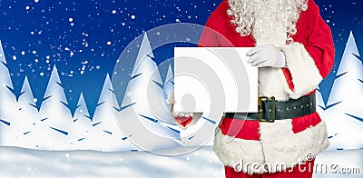 Santa holds an empty white sign for advertising in the camera Stock Photo