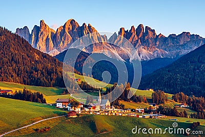 Santa Maddalena (Santa Magdalena) village with magical Dolomites mountains in autumn, Val di Funes valley, Trentino Alto Adige Stock Photo