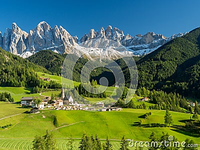 Santa Maddalena village in front of the Geisler or Odle Dolomites Group , Val di Funes, Italy, Europe. September, 2017 Stock Photo