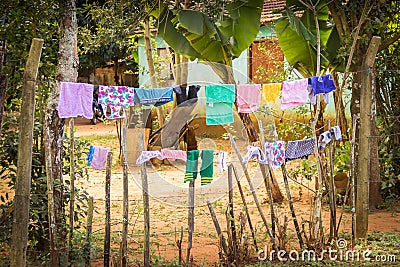 Santa Maria de Fe, Misiones, Paraguay - Street View of Drying Laundry in the Front Yard Stock Photo