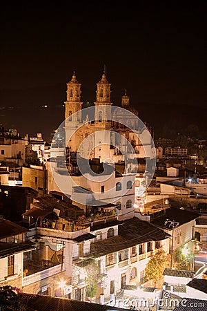 Santa Prisca cathedral at night, in Taxco, guerrero, mexico. Stock Photo