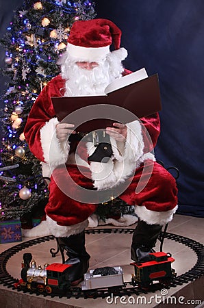 Santa Reading Stock Photo