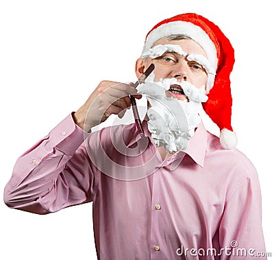 Santa shaving his foam beard Stock Photo