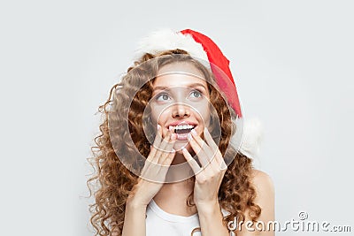 Santa woman laughing on white background. Christmas and New Year party Stock Photo