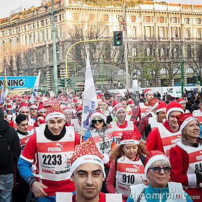 Almost 10.000 Santas take part in the Babbo Running in Milan, Italy Editorial Stock Photo