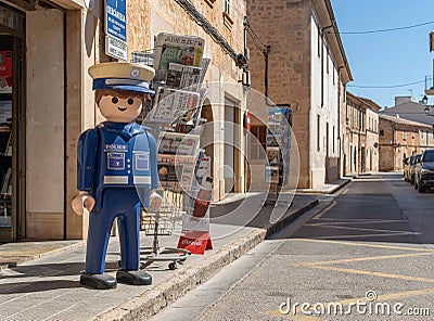 Sculpture of a Playmobil doll of a policeman Editorial Stock Photo