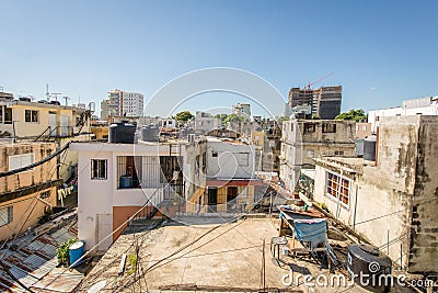 View of The Roofs of Some Poor Houses, There is Much Chaos by the Wires of Electric Poles Editorial Stock Photo