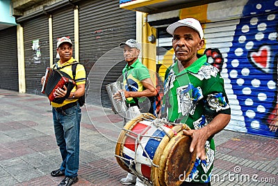 Santo Domingo, Dominican Republic. Merengueros in Calle el Conde, Colonial Zone. Editorial Stock Photo