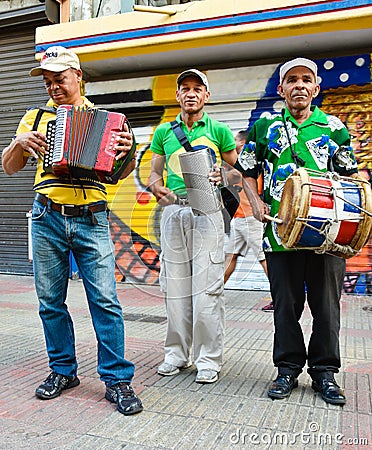 Santo Domingo, Dominican Republic. Merengueros in Calle el Conde, Colonial Zone. Editorial Stock Photo