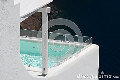 Santorini infinity pool detail on Fira and Oia town in summer traveling time Editorial Stock Photo