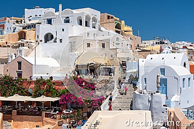 Traditional Greek village, built on volcanic rocks at Oia town. Editorial Stock Photo