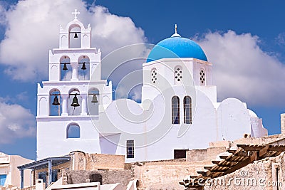 Santorini Greece Church with bells and cross against blue sky Stock Photo