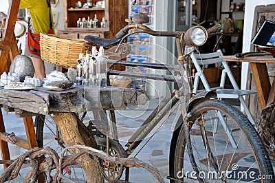 SANTORINI GREECE - SEPTEMBER 14, 2013: Souvenir shop and old retro bicycle in Oia santorini Greece Editorial Stock Photo