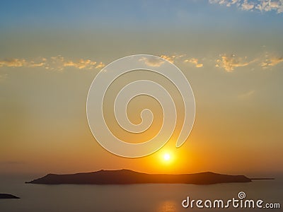 Santorini island with Firostefani Church against the sunset Stock Photo