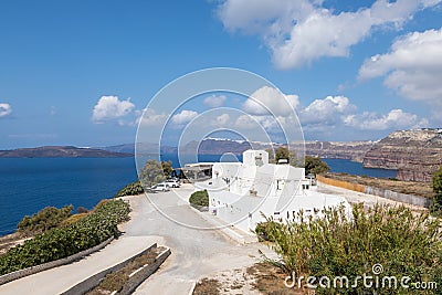 Restaurant on the edge of cliff. Santorini, Greece Editorial Stock Photo
